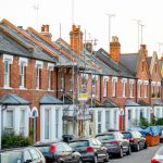 Traditional Victorian Terraced Houses , One Covered With Scaffolding
